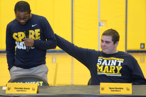 Carredyn Steele and Ryan Cheshire signed to play football at St. Mary's.