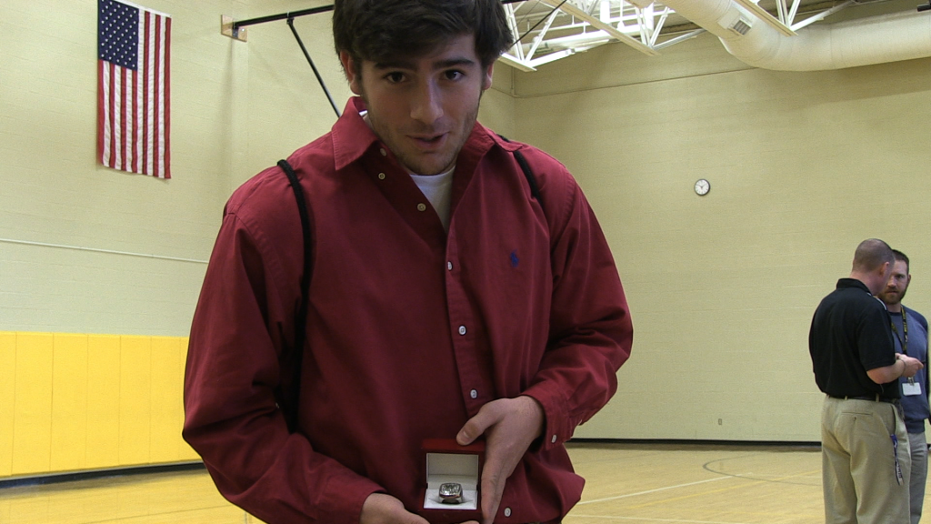 Senior Robert Rice shows off his State Champs Ring.