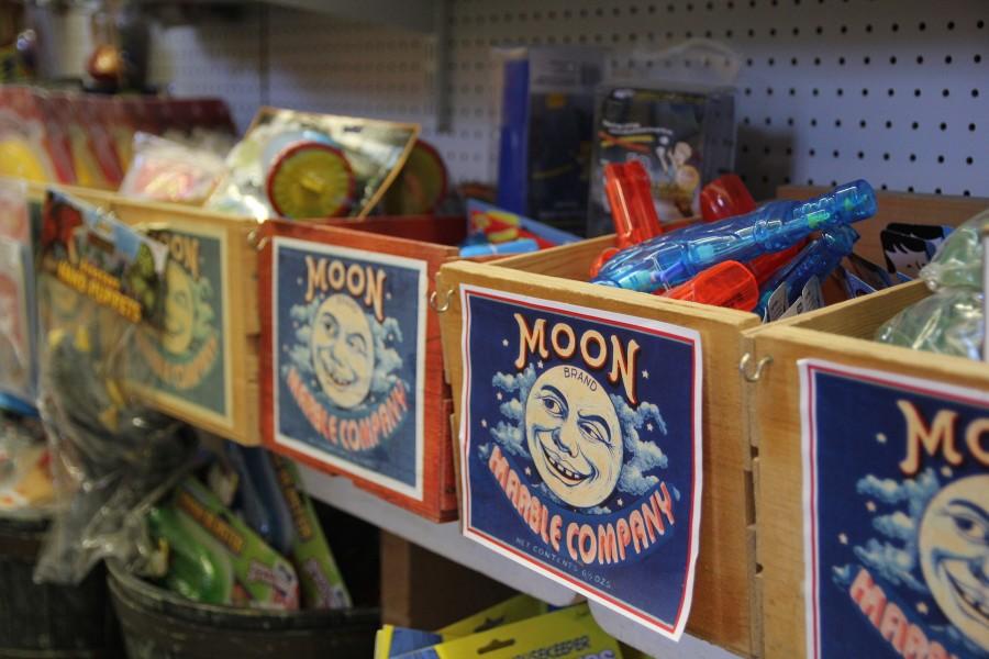 Trays of assorted toys at The Moon Marble Company. Photo by Jenna Wilson.