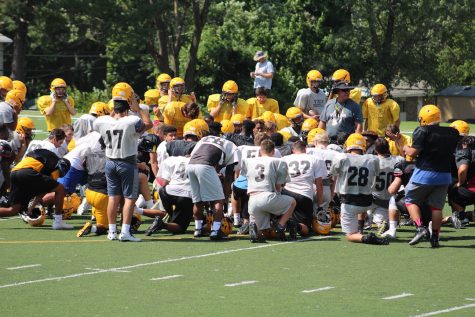 Coach Callaghan has a talk with the players