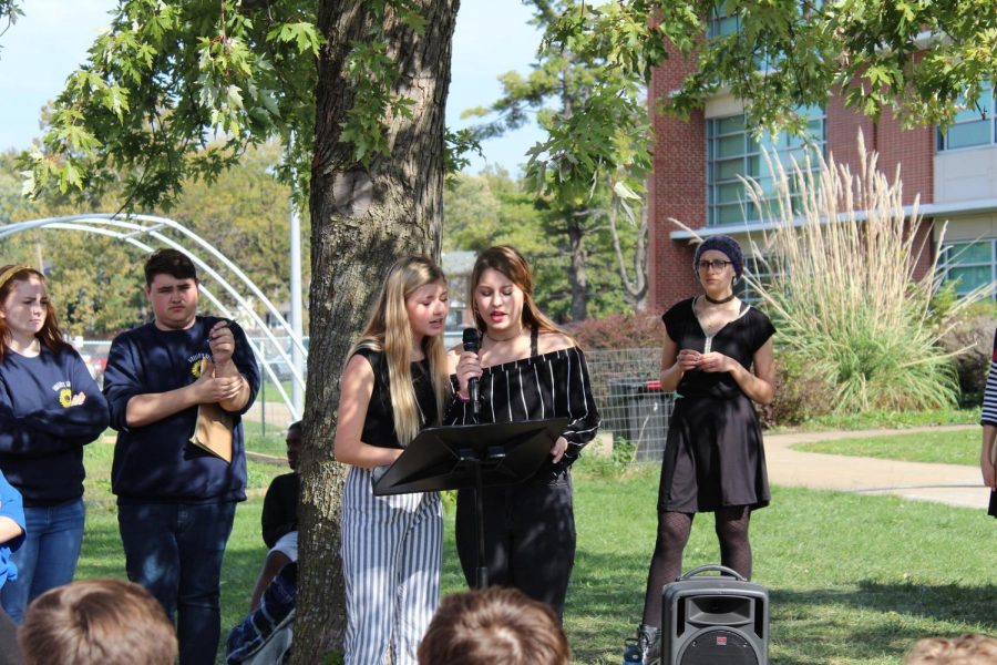 Alex Tyler & Zoe Krowas reading their duet piece at Writers Walk