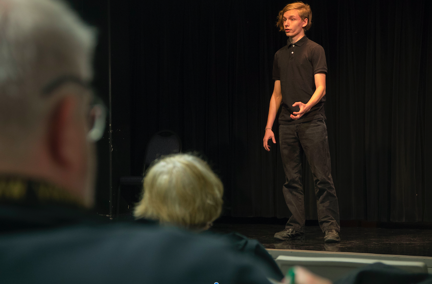 Third-place winner, sophomore Alex Patterson performs in the Poetry Out Loud audition.