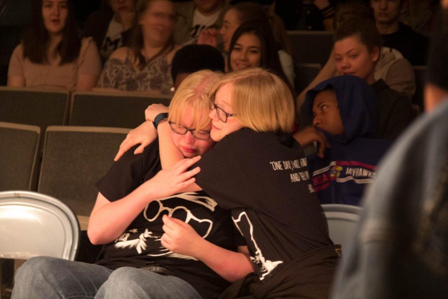 Seniors Callie and Julie sharing a hug after Julies performance. 