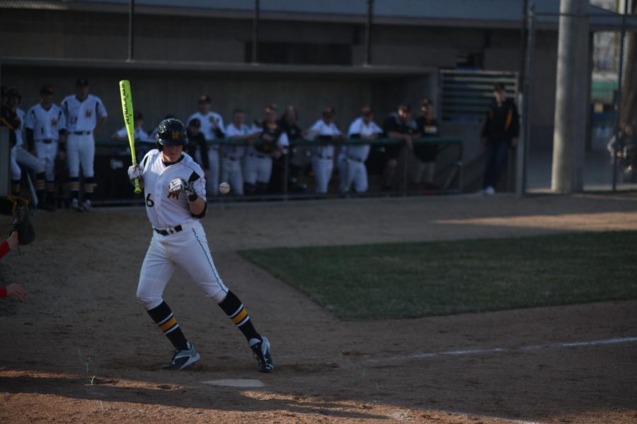 Trevor McCollum gets hit by a pitch for a walk.