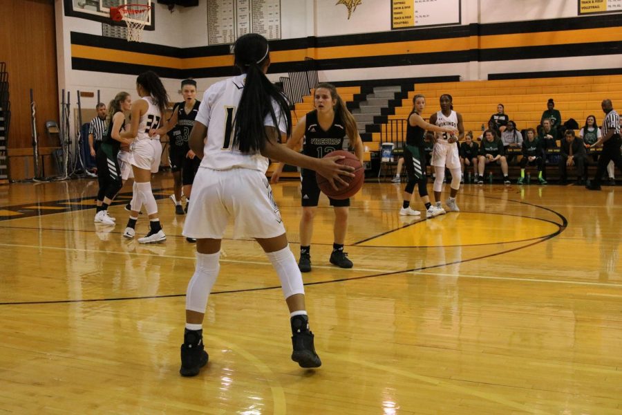 Sophomore Jasmine Patterson gets possession of the ball.