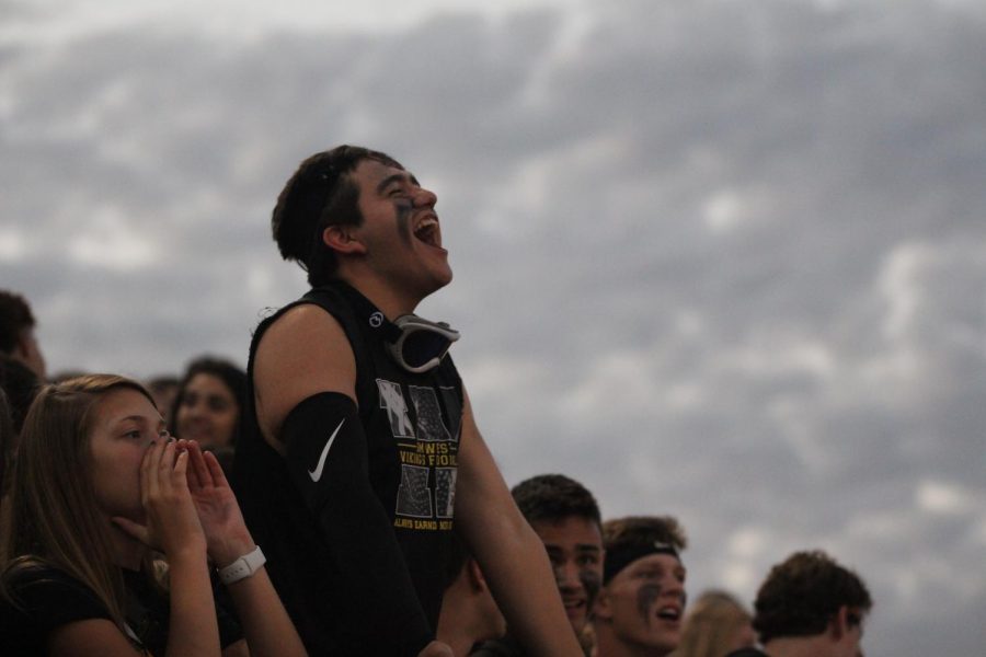 Andrew Fonseca cheering on the football team on Friday night 