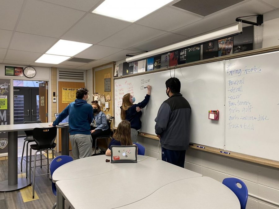 Students brainstorm on the board during class. Photo taken by Amy Morgan.