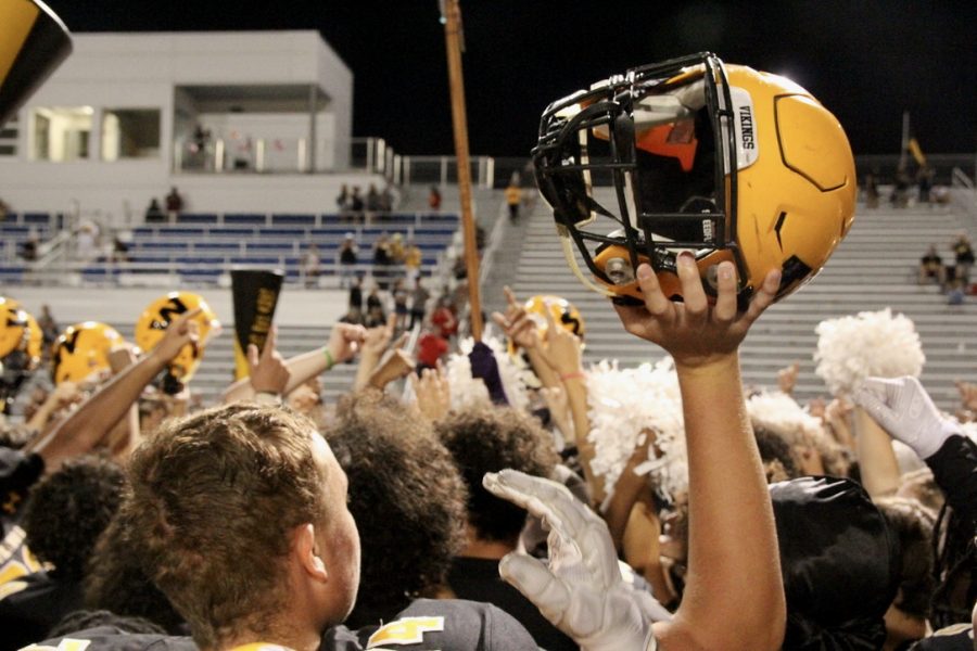 After a successful night, the SMW student section and football team gather to celebrate. 