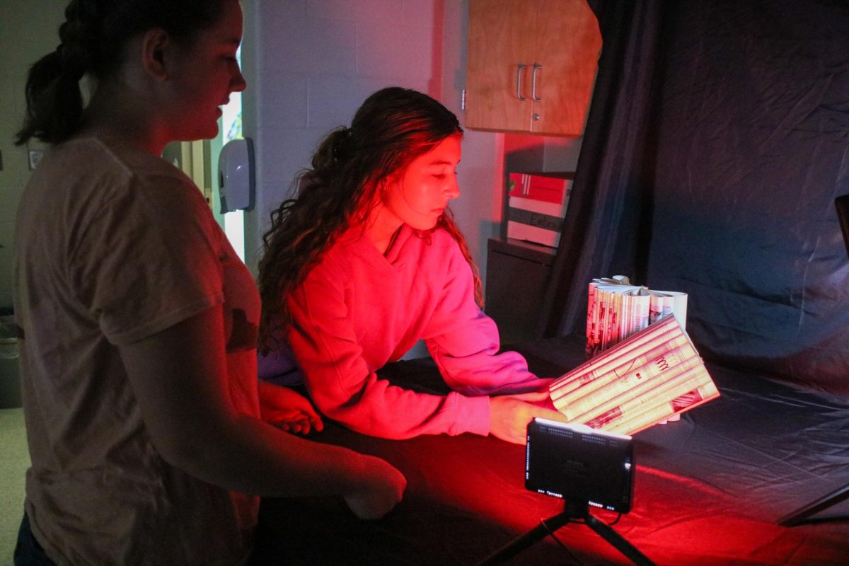 Senior, Makenzie Barker working on a Dark Room project for Jewell’s dark room photography class. Photo taken on October 4th, 2024. 